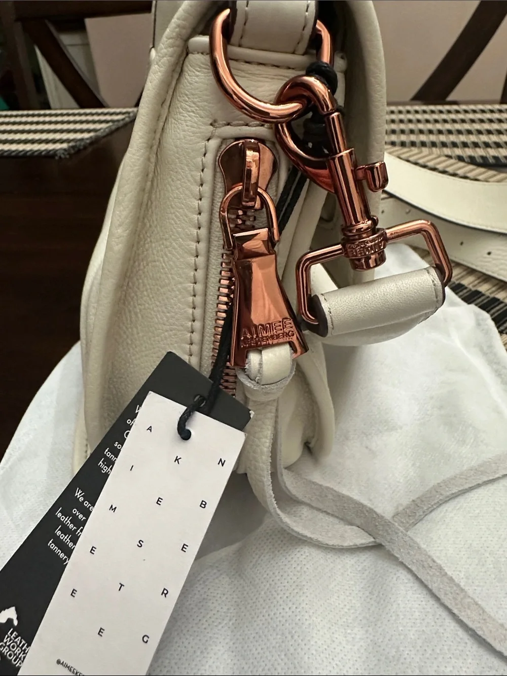 Aimee Kestenberg Cream Great Escape Crossbody Bag with Rose Gold Accents